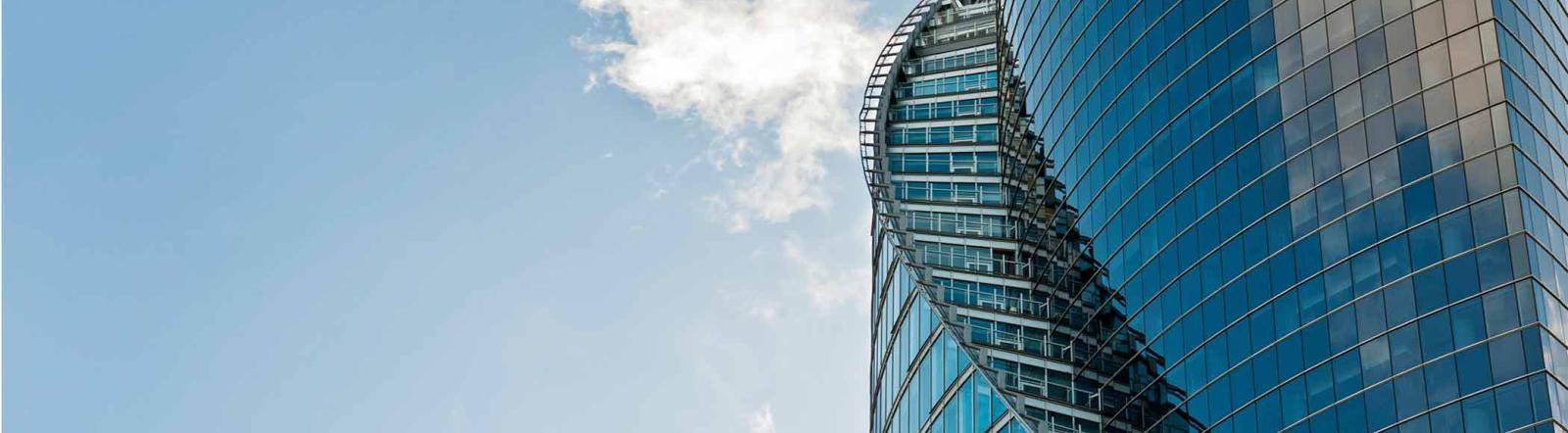 blue building and sky with clouds