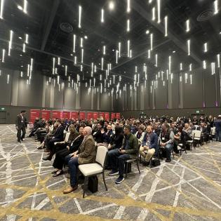 Group of CCIM with Region Banners