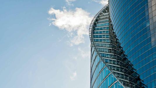 blue building and sky with clouds